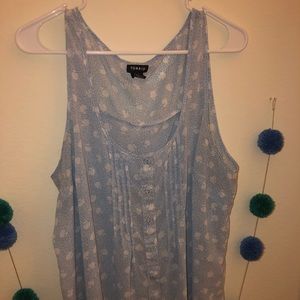 Light blue tank with white floral pattern design